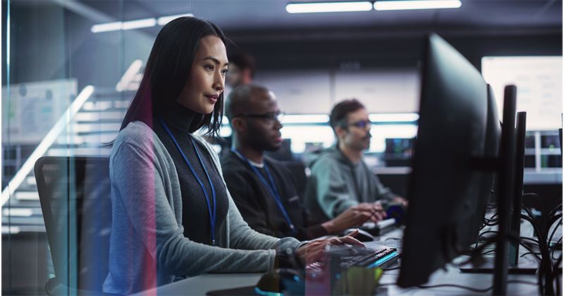 Japanese professionals using AI-powered tools for job search and work research in a modern office environment