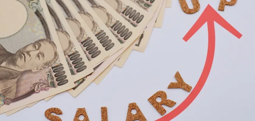 1万円札と給与アップの矢印 — 20代で年収1,000万円を目指す方法。