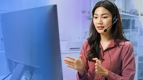 Office professional conducting an online interview with headset